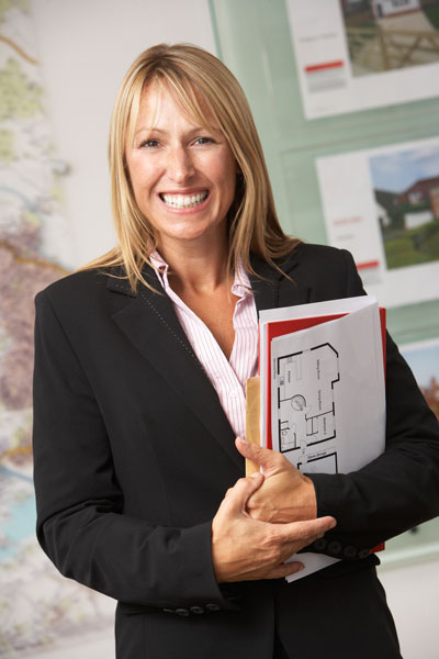 Smiling Agent Holding Blueprints